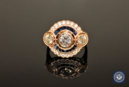 A 14ct yellow gold sapphire and diamond Art Deco style cluster ring,