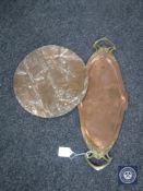 An Art Nouveau copper and brass tray and a circular copper plaque