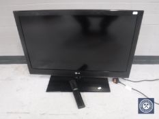 An LG 32LV355T 32" TV with remote