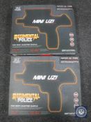 Four boxed Regimental Police mini uzi electric guns