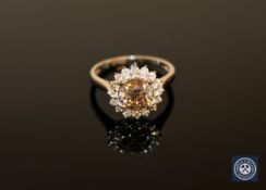 A 14ct white gold diamond cluster ring,