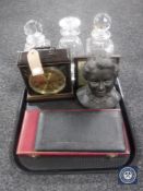 A tray containing three lead crystal decanters with stoppers, Metamec mantel clock,