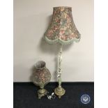 A brass and onyx standard lamp with shade together with similar table lamp