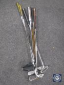 A bundle of seven assorted golf clubs - two Ping irons,