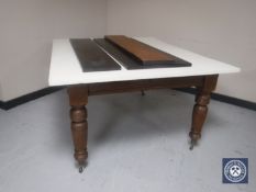 A Victorian mahogany wind out table with three leaves (top painted) CONDITION REPORT: