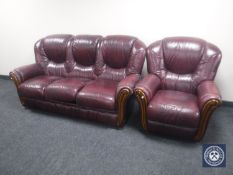 A Burgundy leather three seater settee with armchair