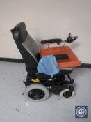 An electric mobility chair with charger