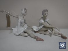 Two Lladro figures of seated ballerinas CONDITION REPORT: One ballerina is holding a