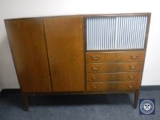 A mid 20th century continental walnut sideboard