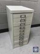 A metal ten drawer index chest