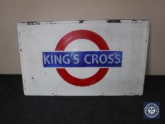 A mid 20th century enamelled panel with hand painted Kings Cross logo