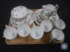 A tray containing a Mayfair pottery service and a Colclough tea service