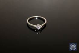 A platinum and diamond solitaire ring,