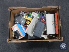 A box containing micro machines and accessories