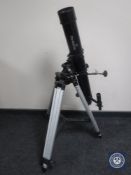 A Sky Watcher telescope on stand with carry bag