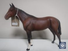 A Beswick horse in brown matt finish