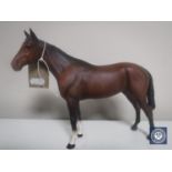 A Beswick horse in brown matt finish