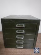 A five drawer metal desk top index chest