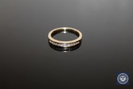A 9ct gold diamond half-eternity ring,