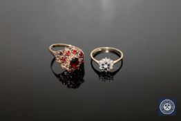 A 9ct gold garnet ring and similar sapphire ring