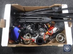 A box containing Floureon microphones, condenser microphone, assorted music stands,
