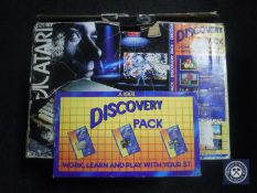 A boxed Atari 520ST together with discovery pack and a ukulele