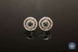 A pair of 14ct yellow and white gold diamond stud earrings,