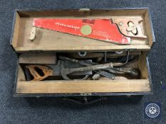 A mid 20th century joiners tool box with tools
