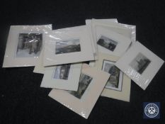 A box containing a quantity of unframed colour engravings in mounts