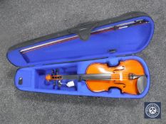 A full size violin in case with bow