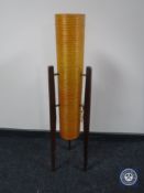 A mid 20th century rocket lamp on teak legs CONDITION REPORT: Fitted with a vintage