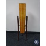 A mid 20th century rocket lamp on teak legs CONDITION REPORT: Fitted with a vintage