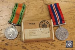 A Second World War pair comprising War Medal and Defence Medal, unnamed as issued,