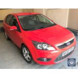 A Ford Focus Zetec 100 five-door hatchback motorcar,red, petrol, 1596 CC, registration NX58 PZB,