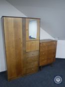 A mid 20th century Symbol Furniture gent's wardrobe together with matching five drawer chest