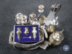 A tray of silver plated items, glass claret jug,