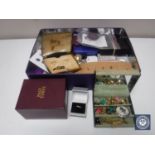 A box of costume jewellery, yellow metal ring, earrings etc.