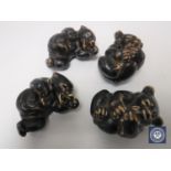 Four Royal Copenhagen bear cubs in mottled brown glaze