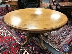 A Victorian walnut oval pedestal breakfast table with inlaid top,