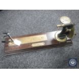 A brass wool tester by Goodbrand and Company Ltd,