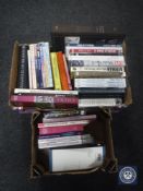 Two boxes containing books, hardback volumes,