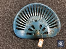 A William Doyle & Co. Ltd. metal tractor seat.