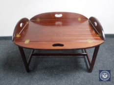 A mahogany butler's tray on stand