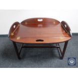 A mahogany butler's tray on stand