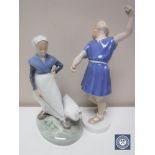 Two Royal Copenhagen figures depicting a girl with a goose and a girl dancing,