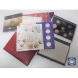 A collection of coins and proof sets to include commemorative coin sets,
