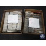 Two boxes of singles to include Rolling Stones, David Bowie, Queen,