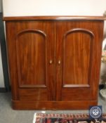 A Victorian mahogany double door cabinet,