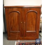 A Victorian mahogany double door cabinet,