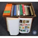 A box containing large quantity of assorted stamps,